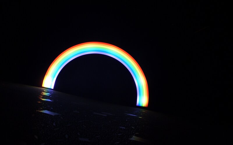 Rainbow light arch at night