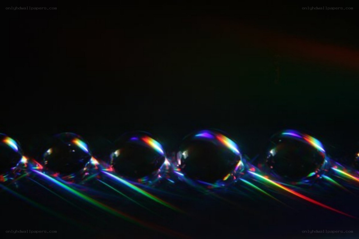Rainbow light on water droplets