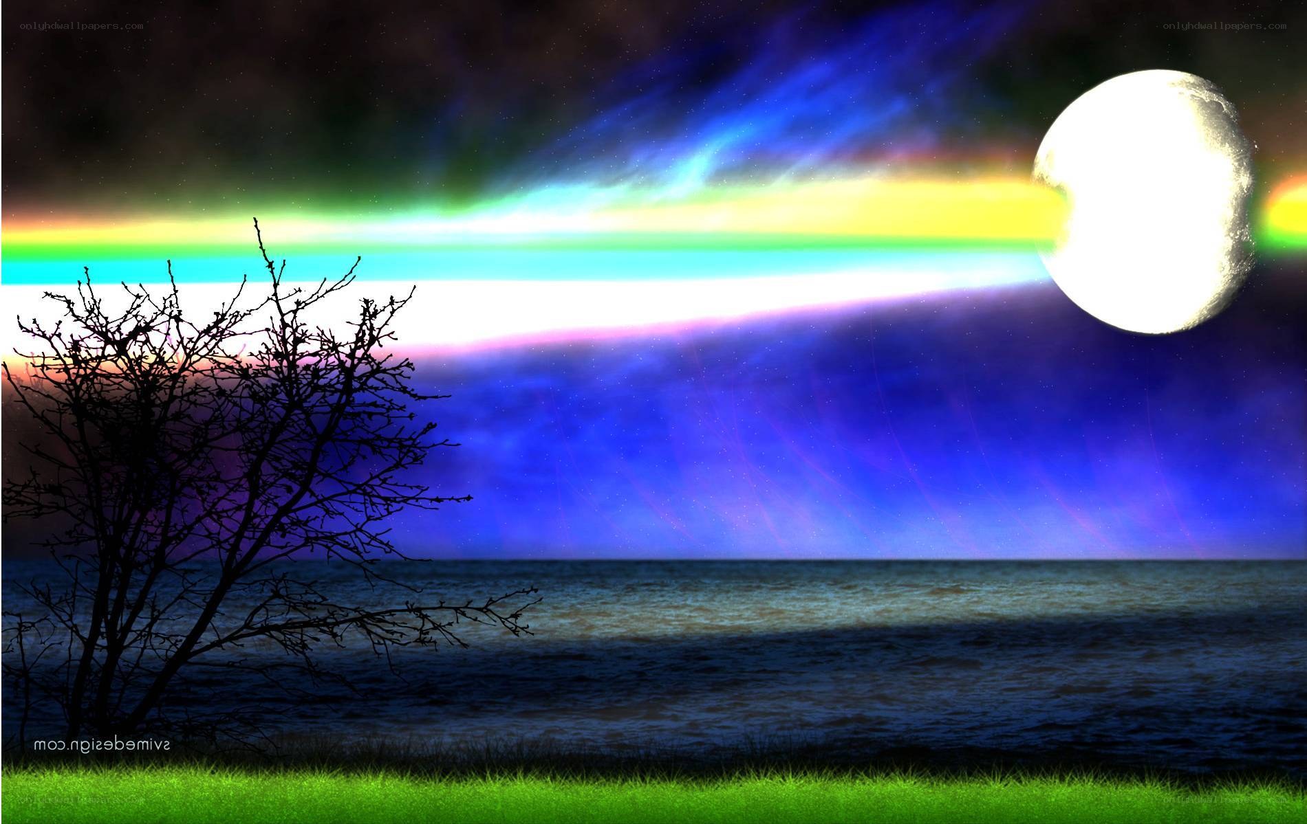 Rainbow light over moonlit sea