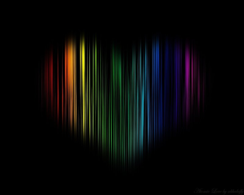 Rainbow light streaks on black