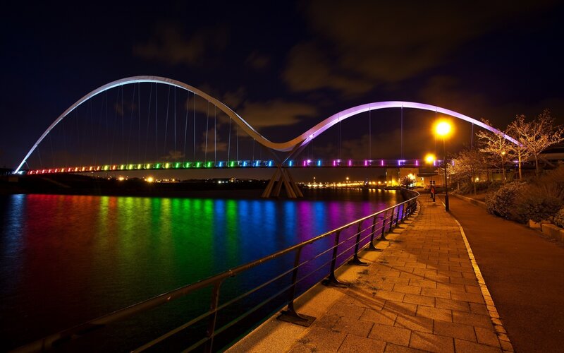 Rainbow-lit Bridge at Night — Black, Serene