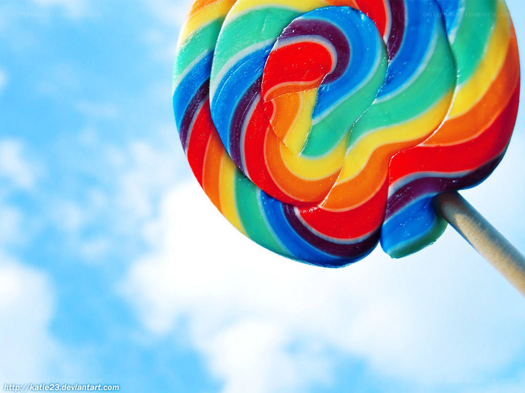 rainbow lollipop against sky