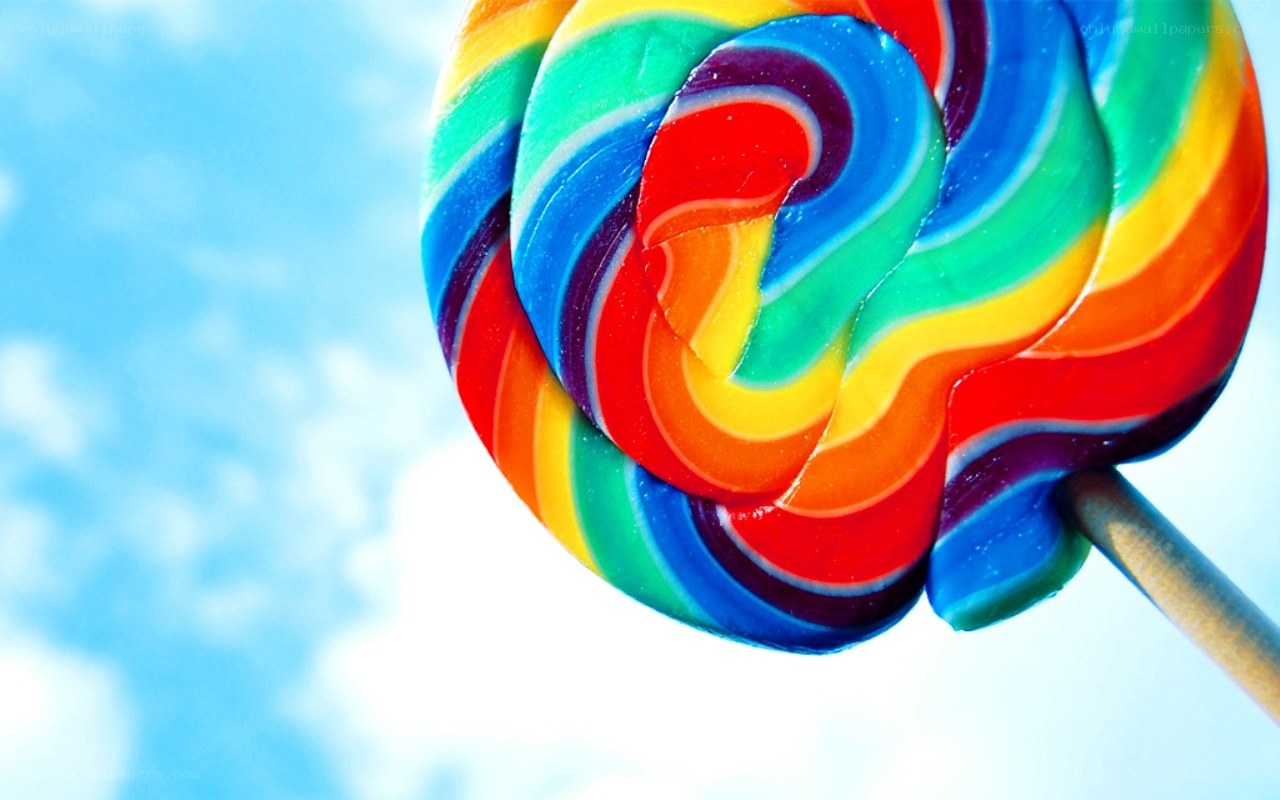 rainbow lollipop against sky