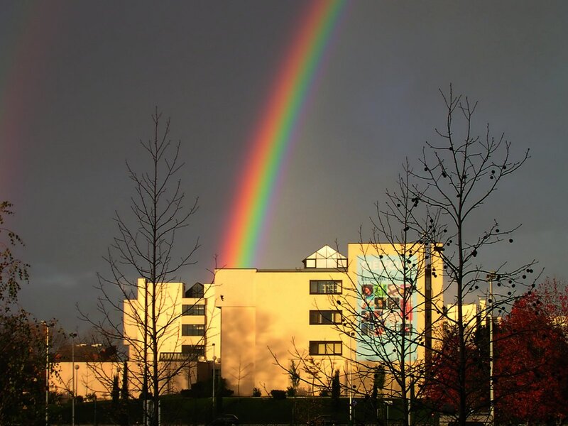 Rainbow over a building