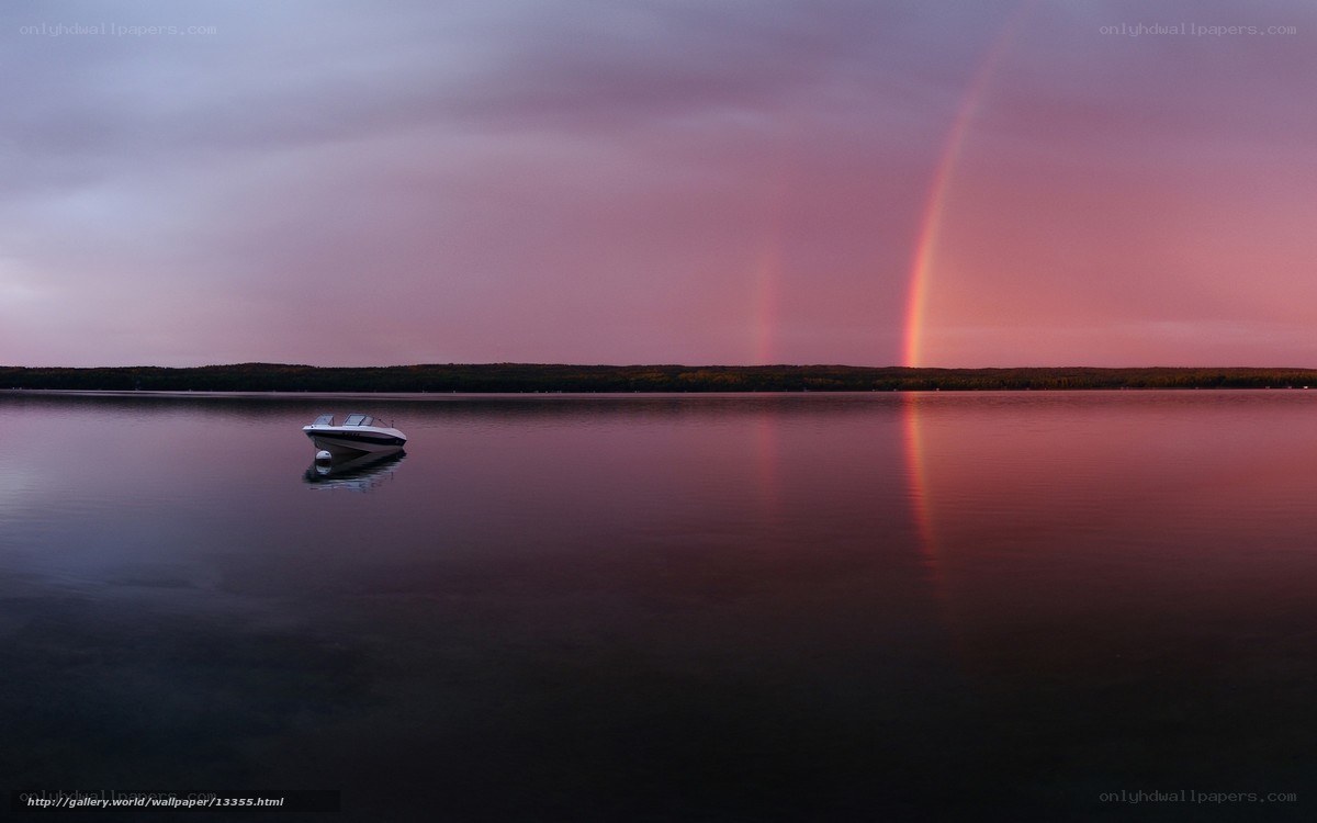Rainbow over a calm lake