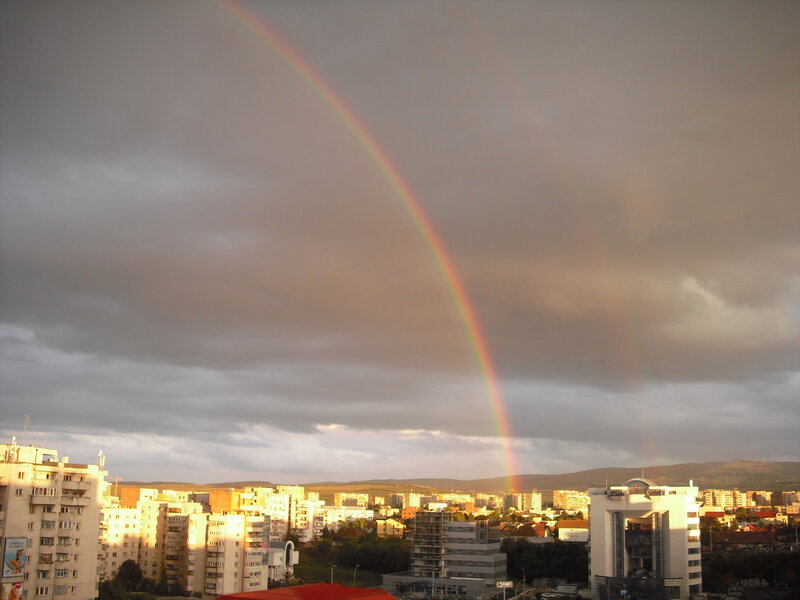Rainbow over a city