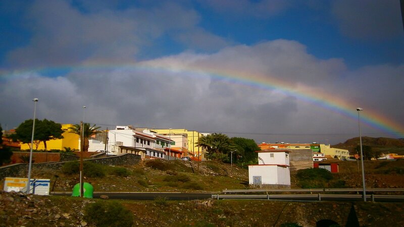 Rainbow over a coastal town