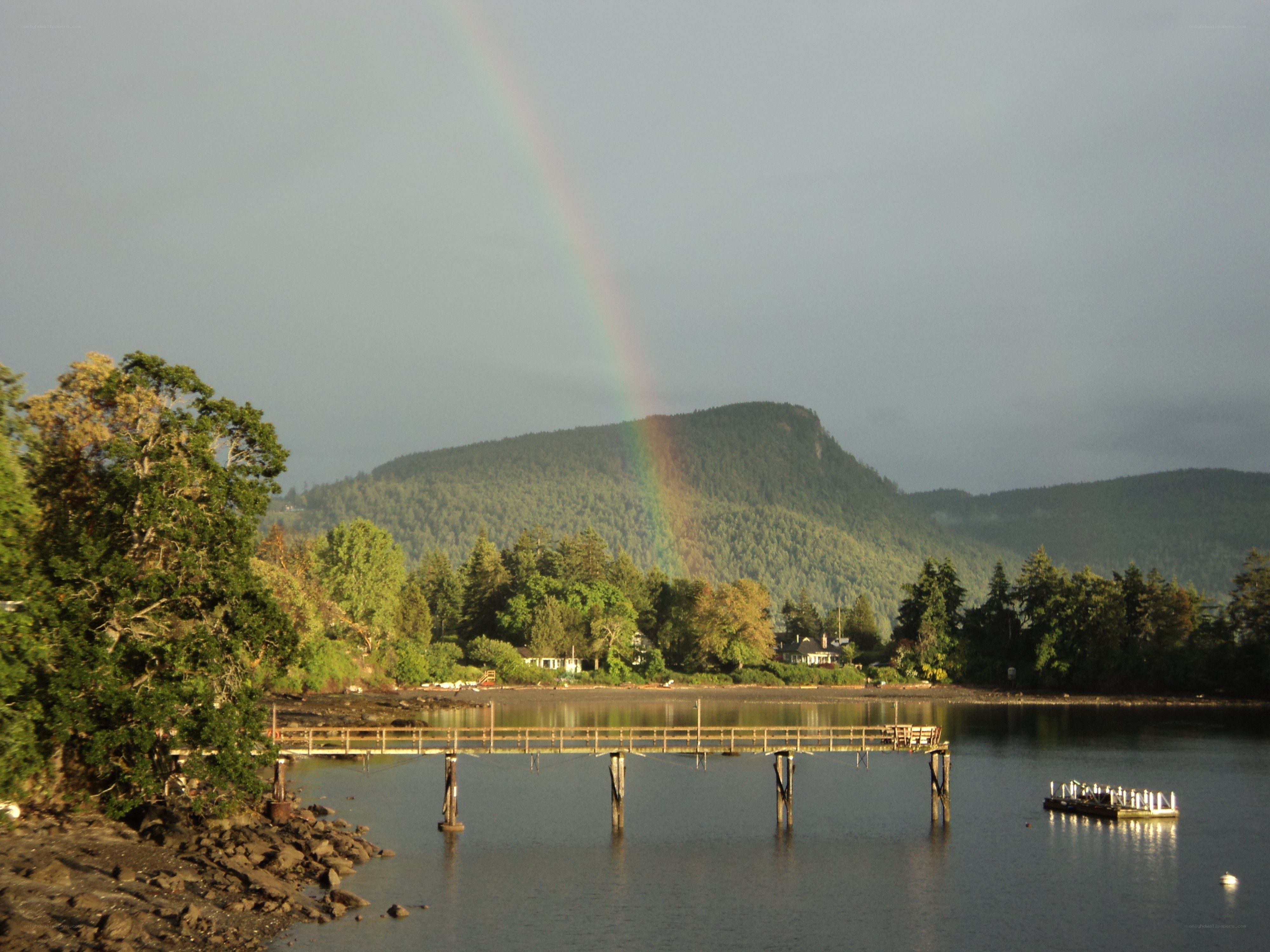 Rainbow over a coastal village
