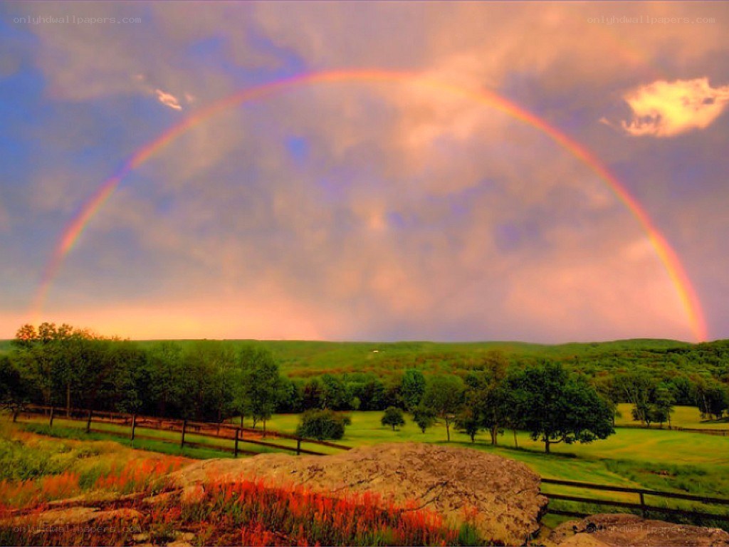 Rainbow over a green valley