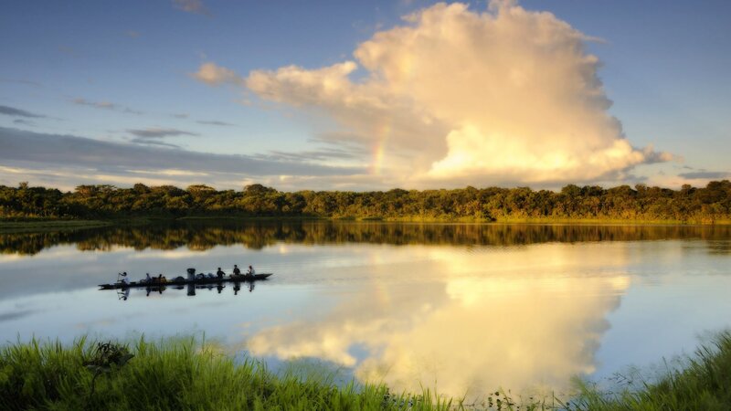 Rainbow over a jungle river