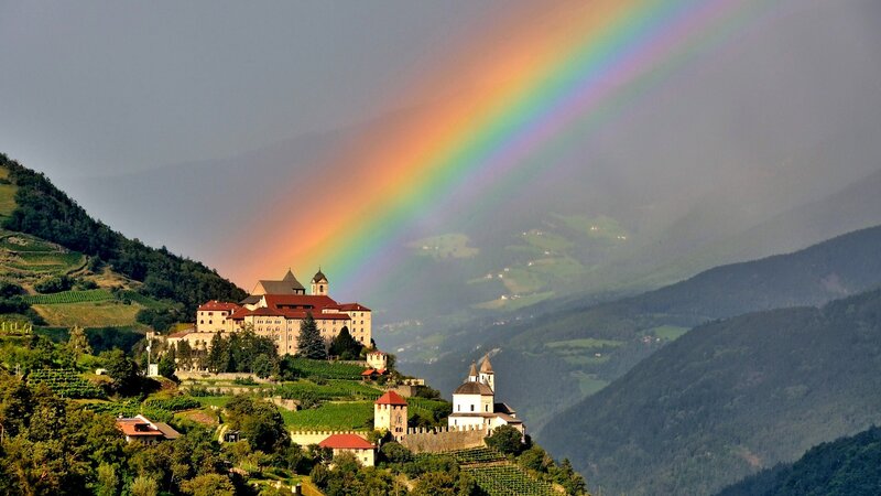 Rainbow over a mountain monastery