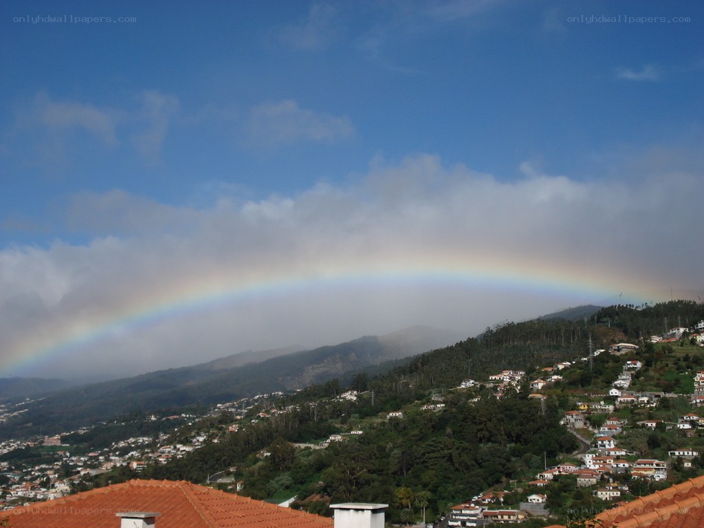 Rainbow over a mountain town