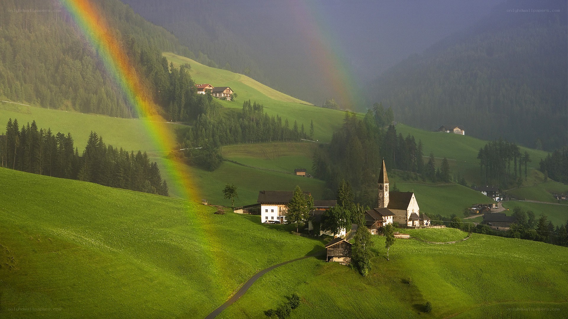 Rainbow over a mountain village
