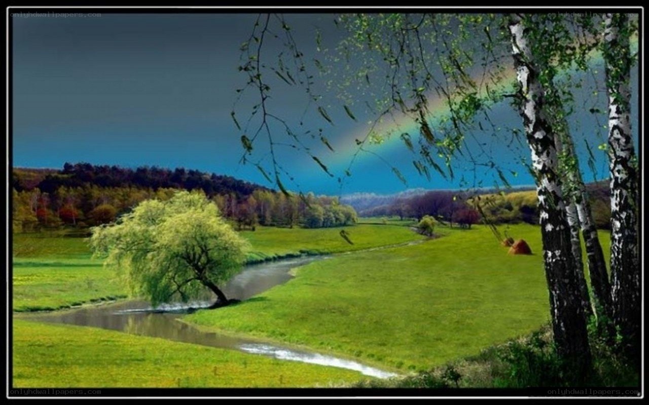 Rainbow over a river valley