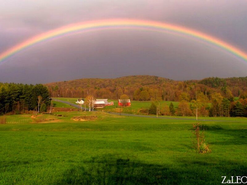 Rainbow over a rural farm