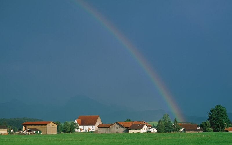 Rainbow over a rural village