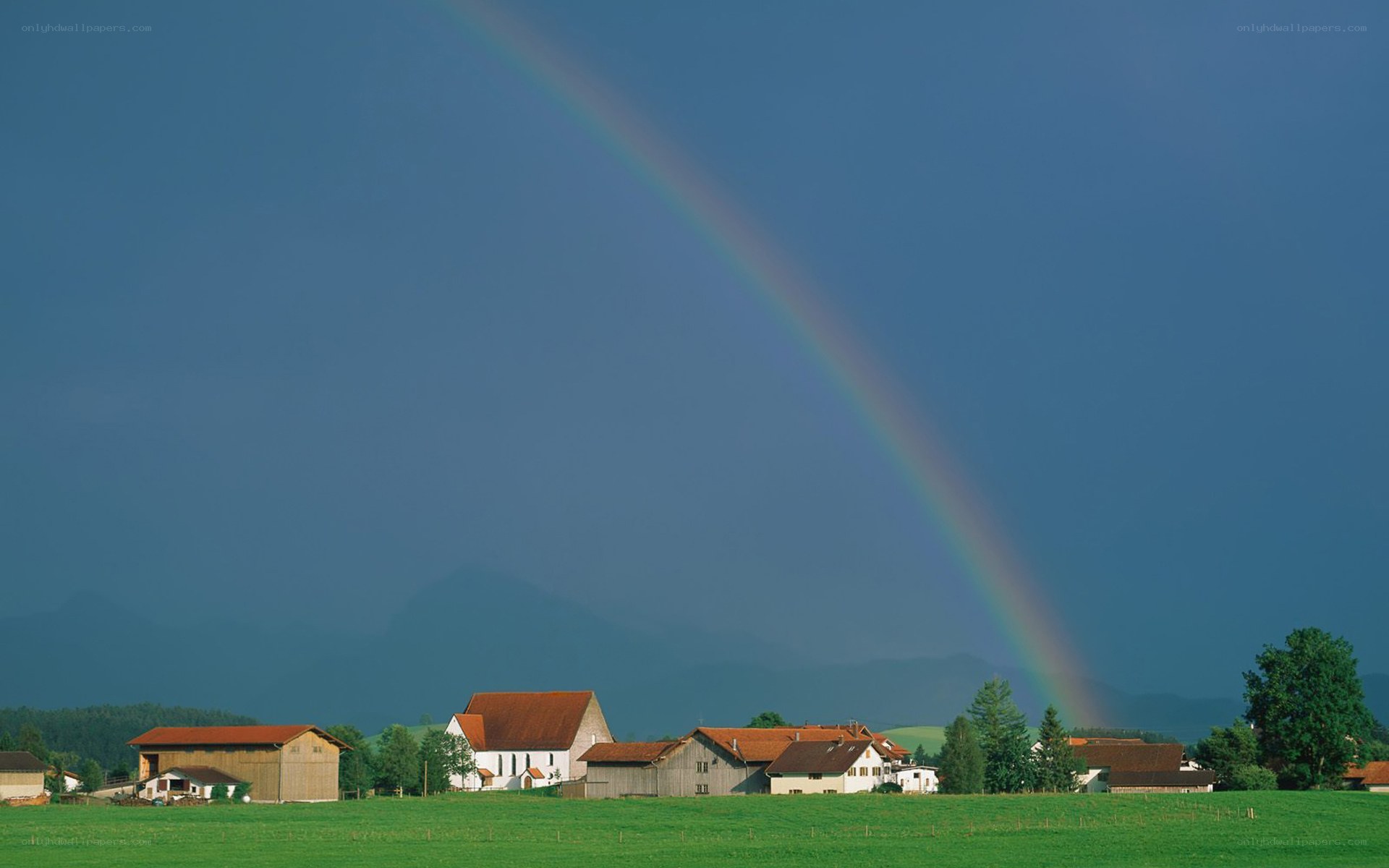 Rainbow over a rural village