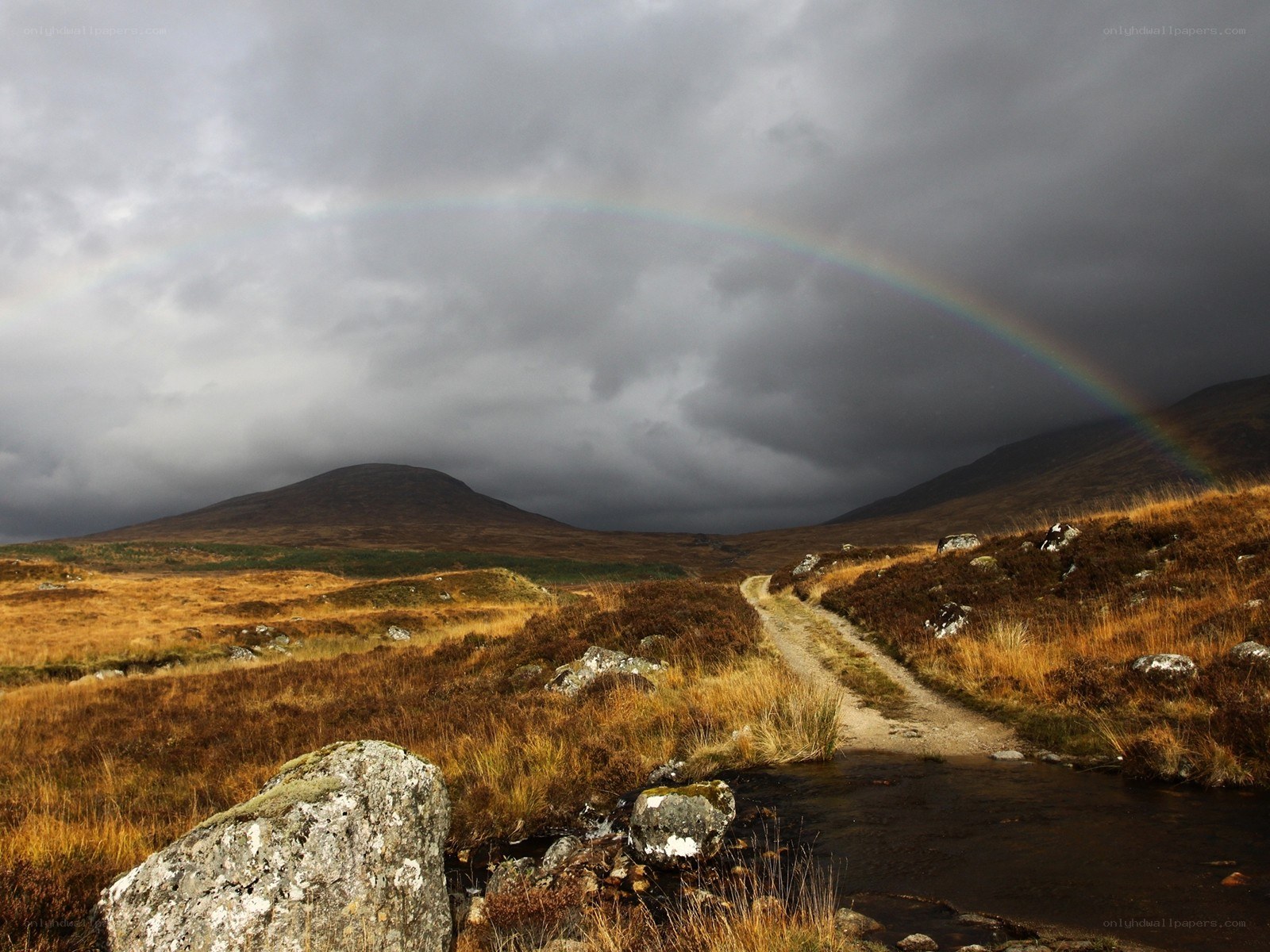 Rainbow over a Scottish glen