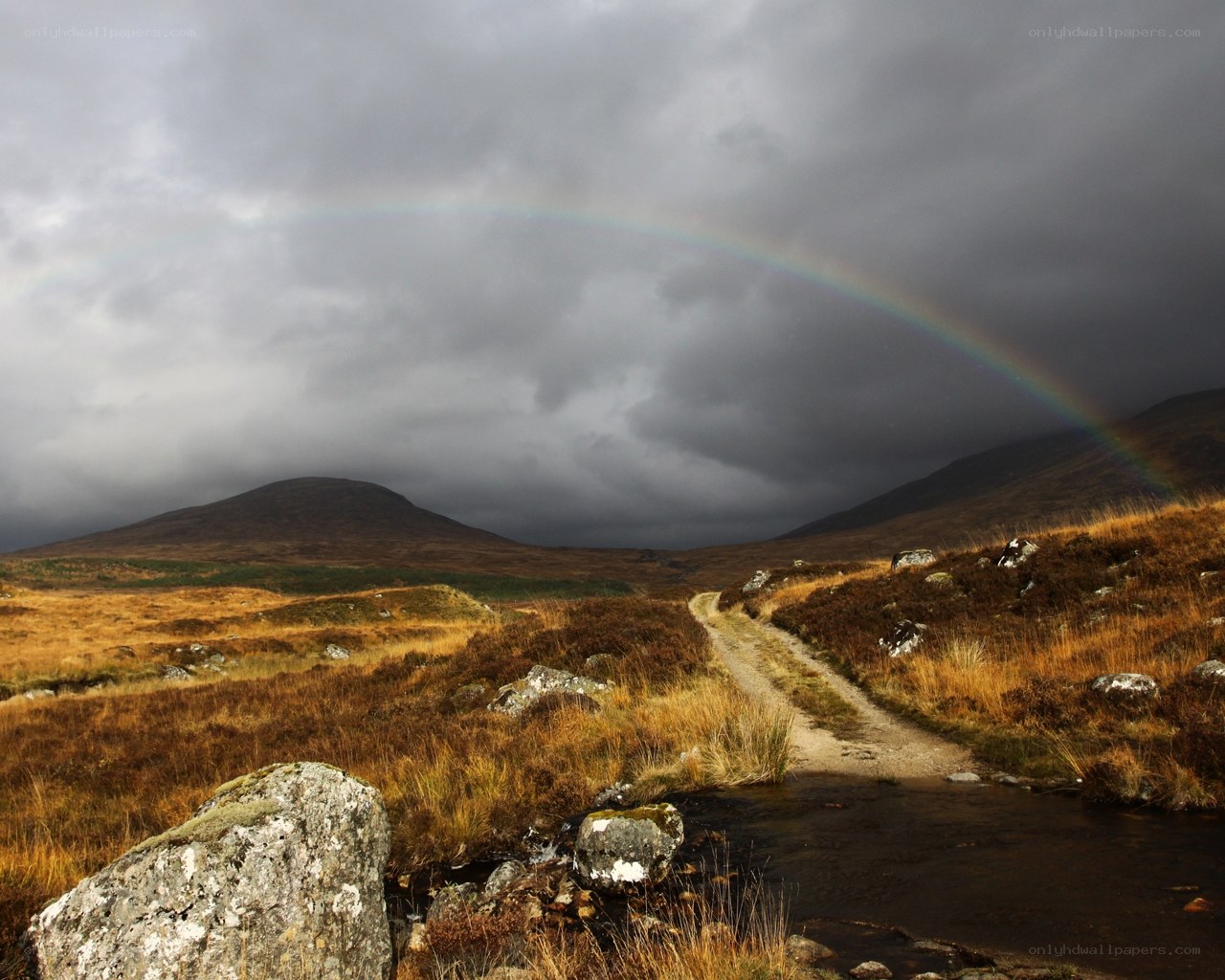 Rainbow over a Scottish glen