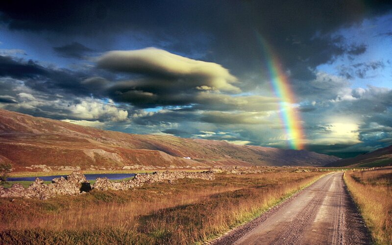 Rainbow over a Scottish landscape