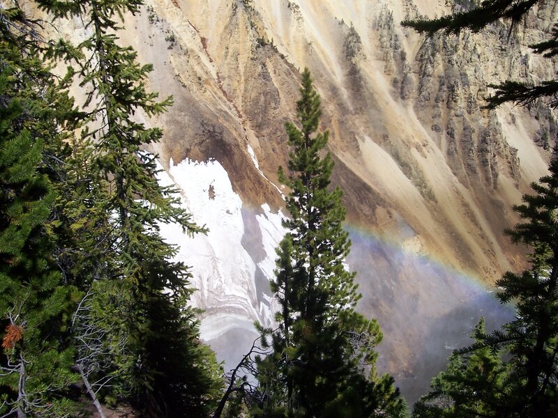 Rainbow over a snowy canyon