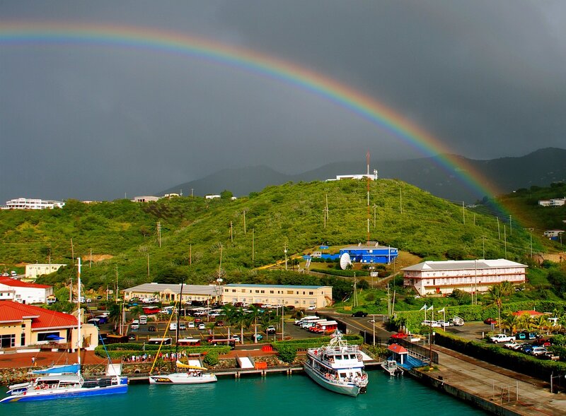Rainbow over a tropical harbor
