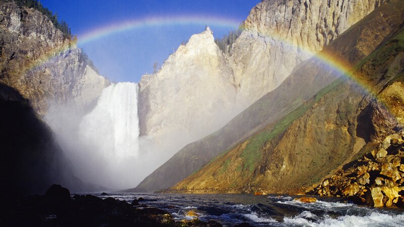 Rainbow over a waterfall