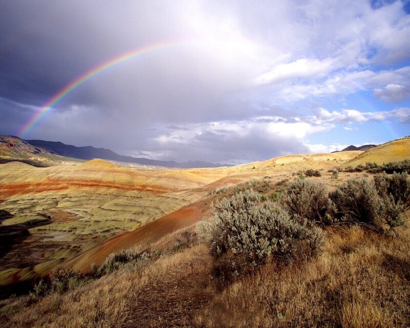 Rainbow over Badlands — Brown, Dramatic