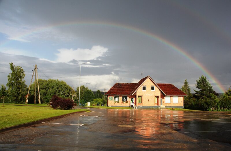 Rainbow over Brick Building