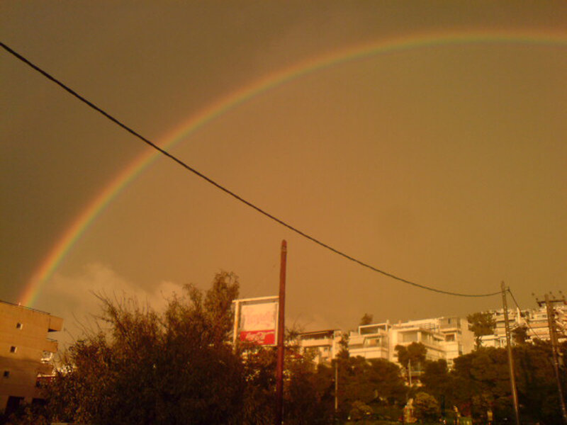 Rainbow over City — Brown, Dramatic