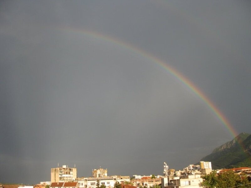 Rainbow over City