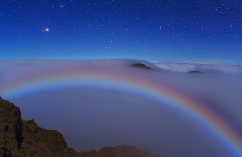 Rainbow over cloud sea