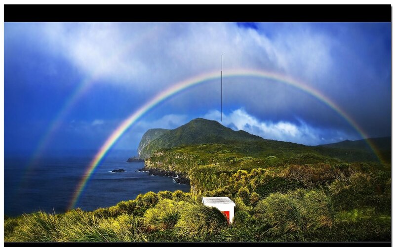 Rainbow over Coastal Cliffs — Blue, Dramatic
