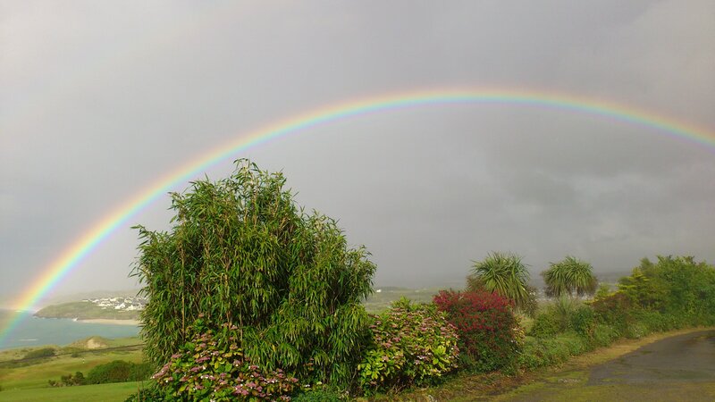 Rainbow over Coastal Landscape — Green, Serene