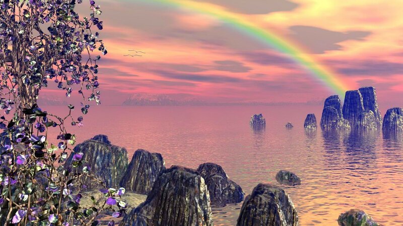 Rainbow over coastal rocks