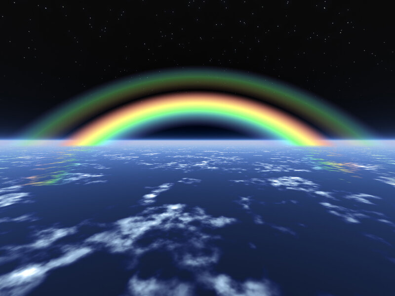 rainbow over earth from space