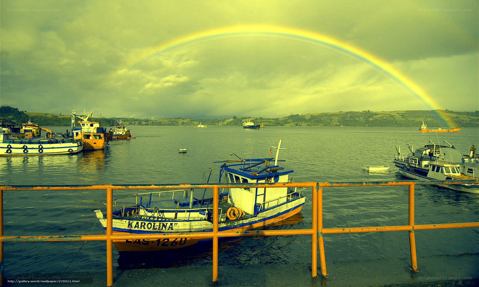Rainbow over fishing boats