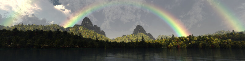 Rainbow over forest lake