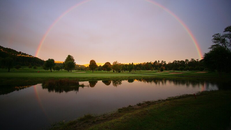 Rainbow over Golf Course — Green, Serene, Sunset