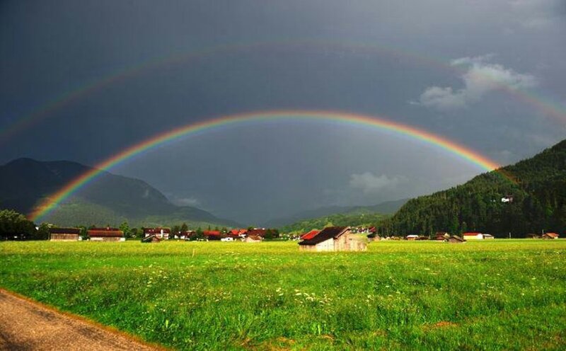 Rainbow over Green Field — Dramatic