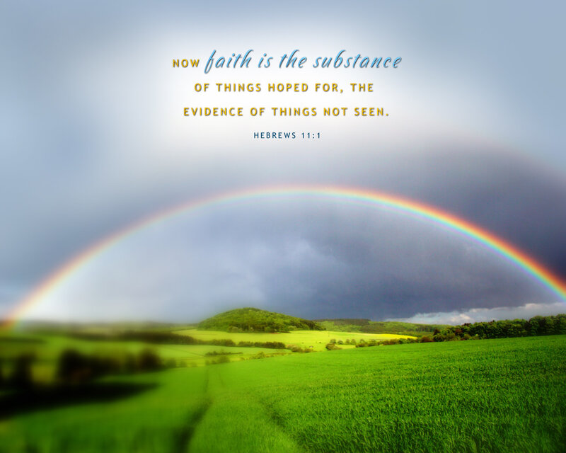 Rainbow over green fields