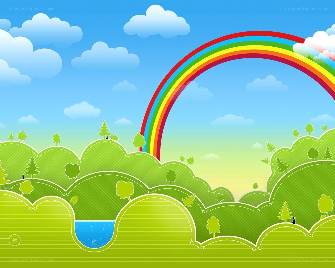 Rainbow over green hills