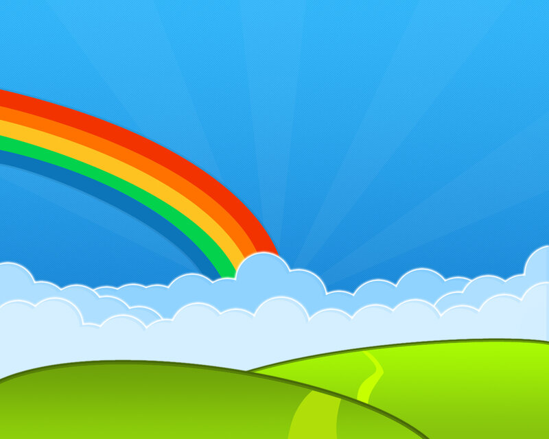 rainbow over green hills