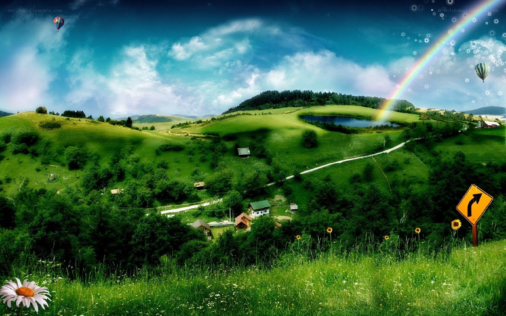 Rainbow over green hills