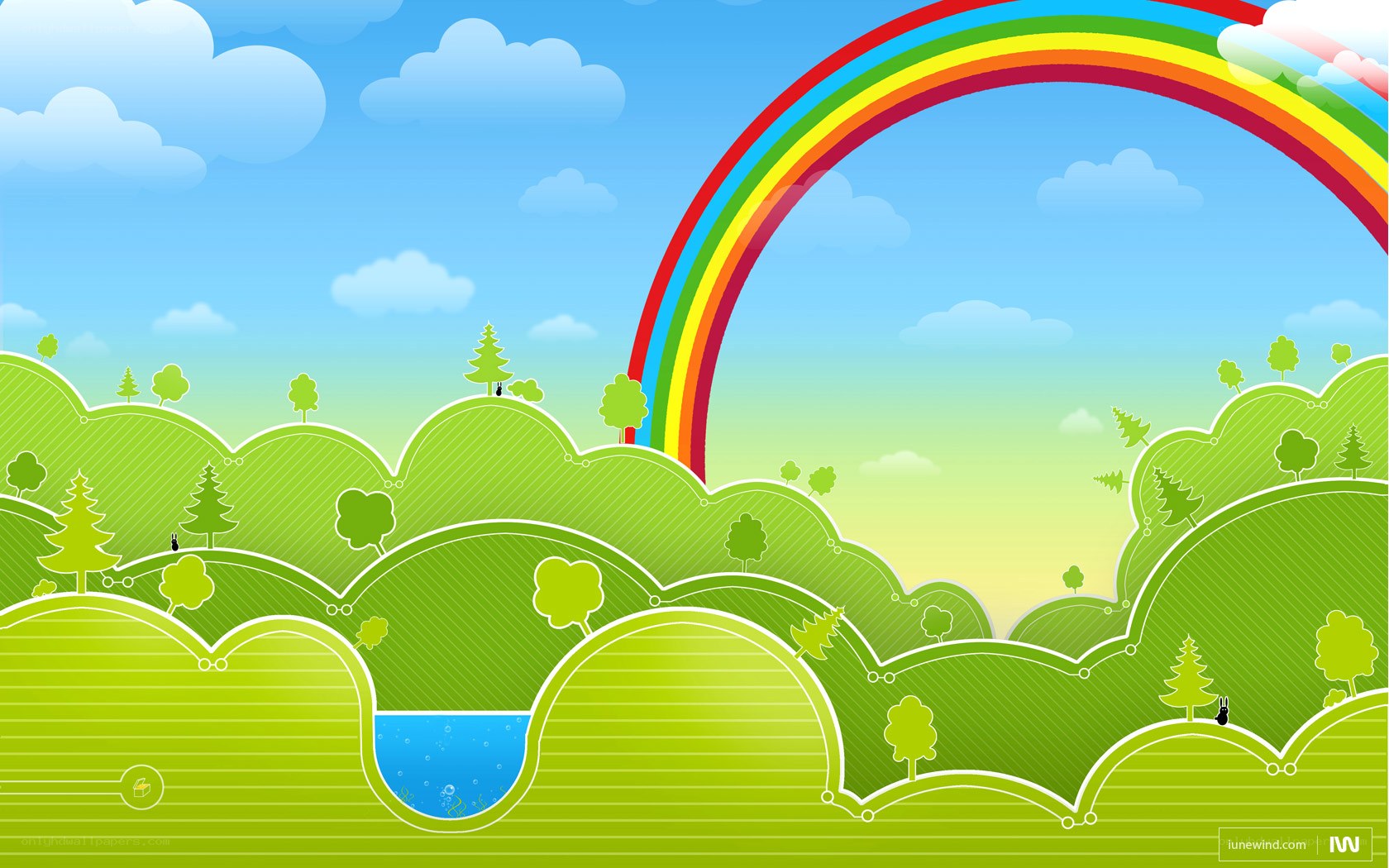 Rainbow over green hills