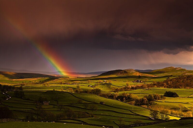 Rainbow over Green Hills — Dramatic, Sunset, Photograph