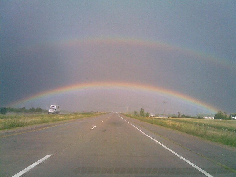 Rainbow over highway
