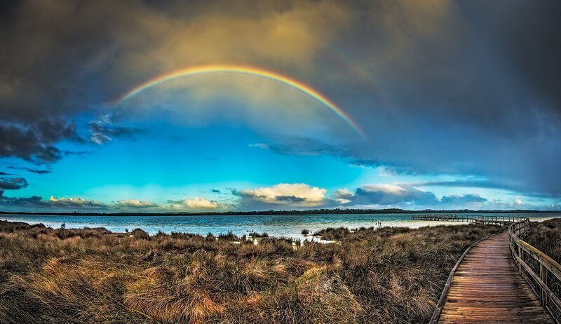 Rainbow over Lake — Blue, Dramatic, Afternoon, Photograph, Boardwalk