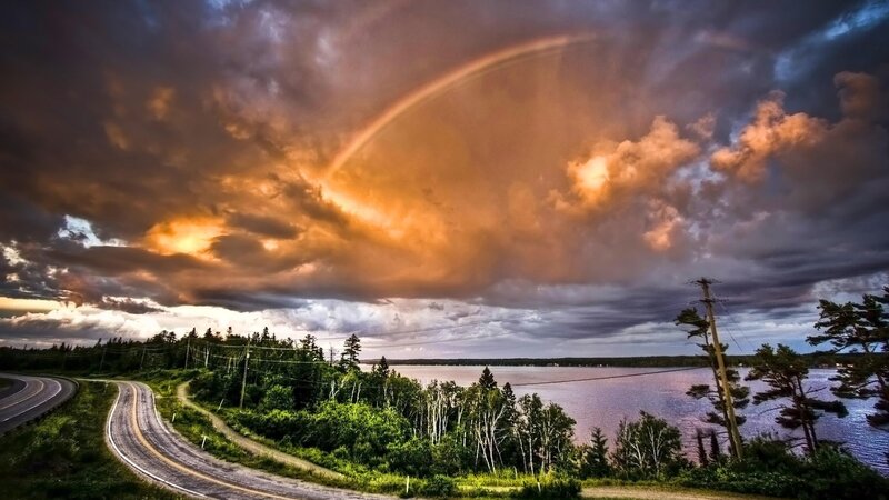 Rainbow over Lake — Sunset