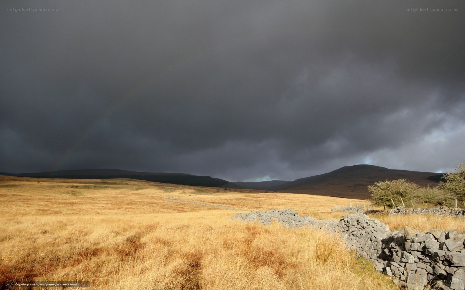 Rainbow over moorland hills